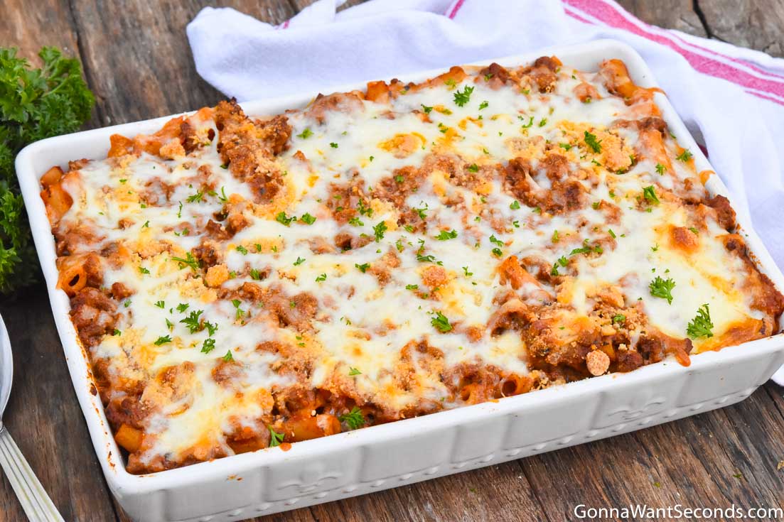 Baked ziti with meat in a casserole dish