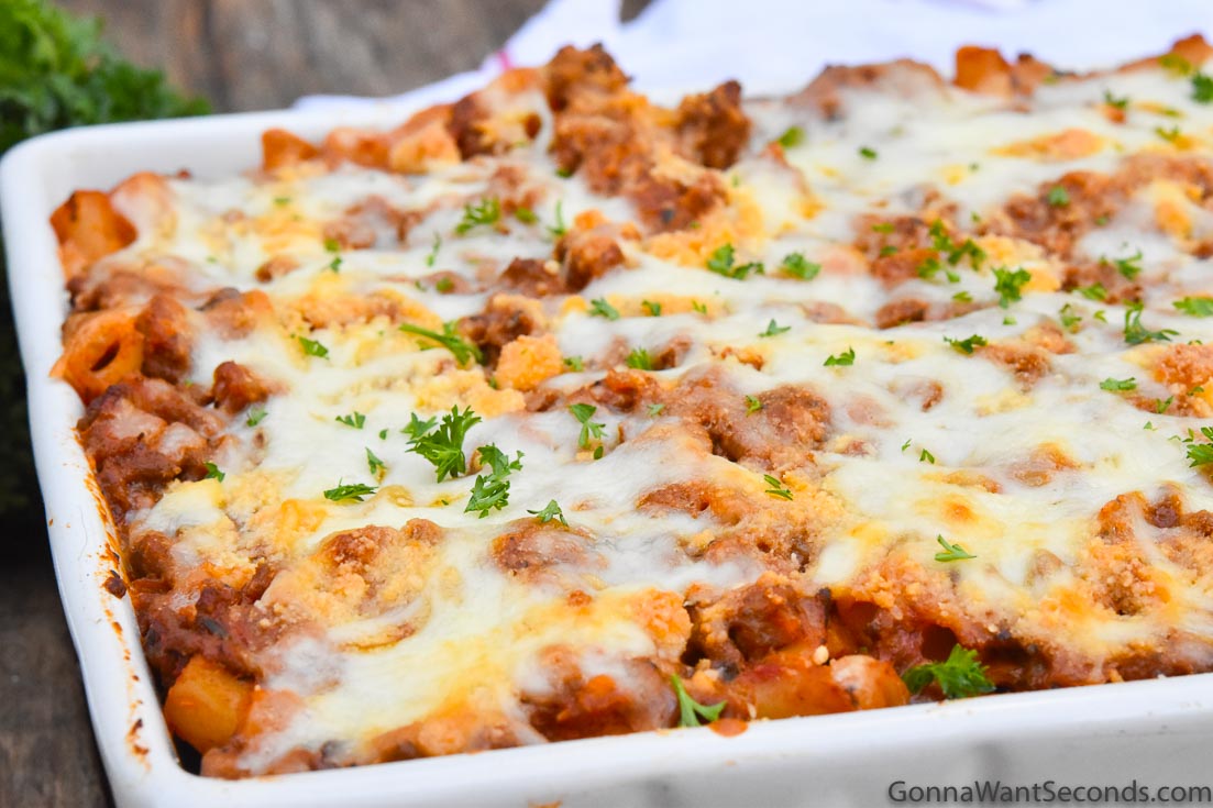 Baked ziti with meat in a casserole dish