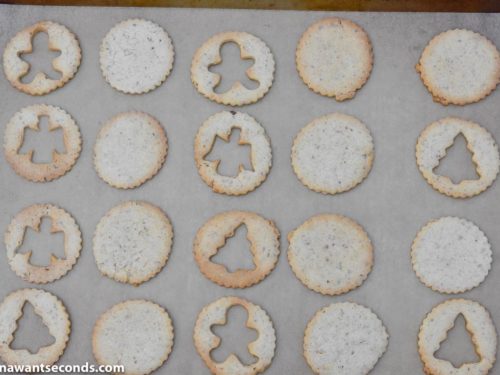 Baked Linzer cookies on a baking sheet