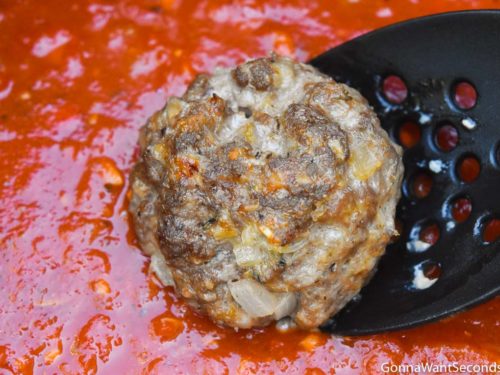 How to make spaghetti and meatballs recipe, putting meatballs in sauce mixture