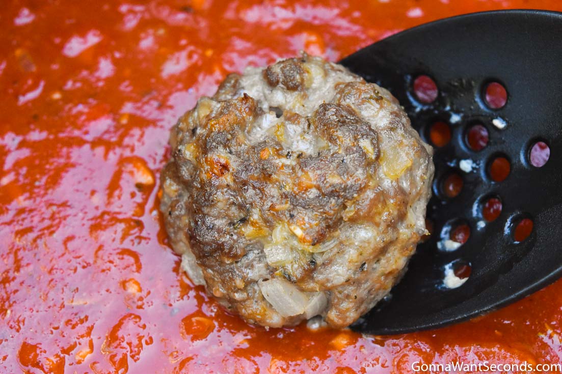How to make spaghetti and meatballs recipe, putting meatballs in sauce mixture