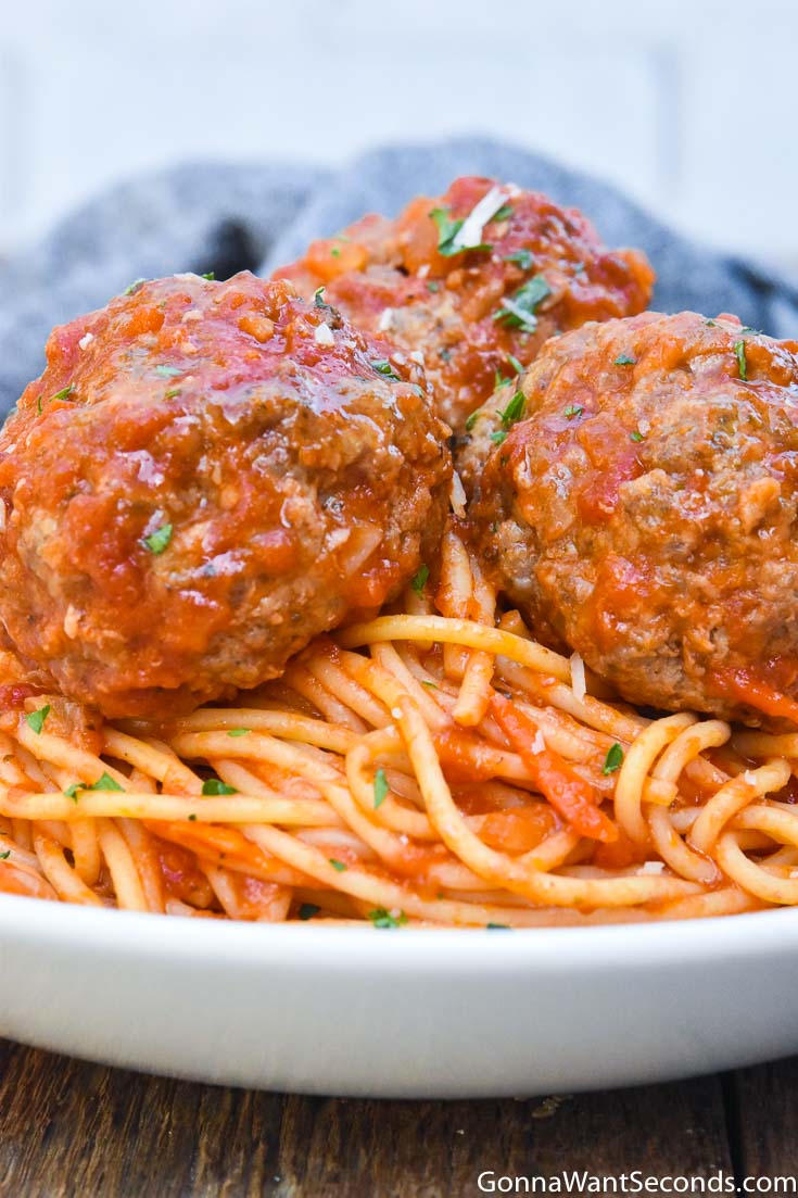 spaghetti and meatballs recipe on a plate