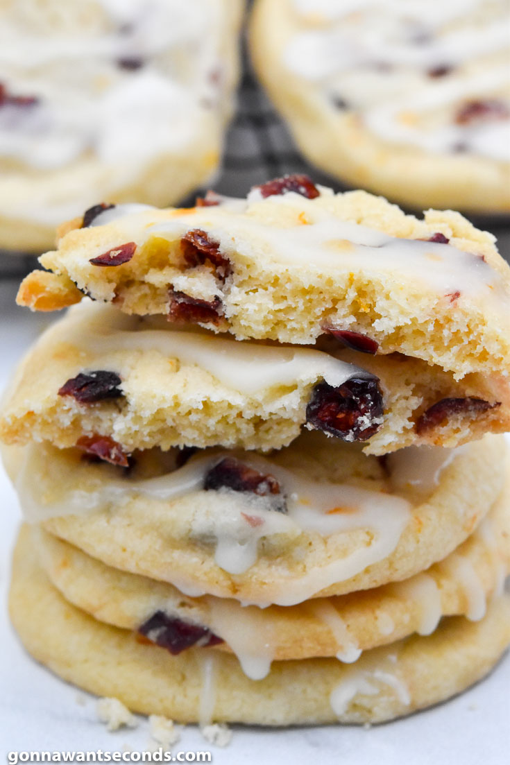 Cranberry orange shortbread cookies stack on top of each other