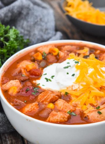 Crockpot Chicken Chili with toppings, in a bowl