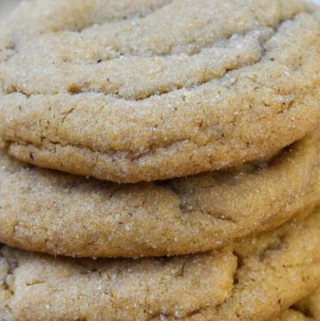 ginger molasses cookies stack on top of each other
