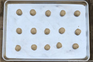 How to make Italian Wedding Cookies, cookie doughs on a baking sheet