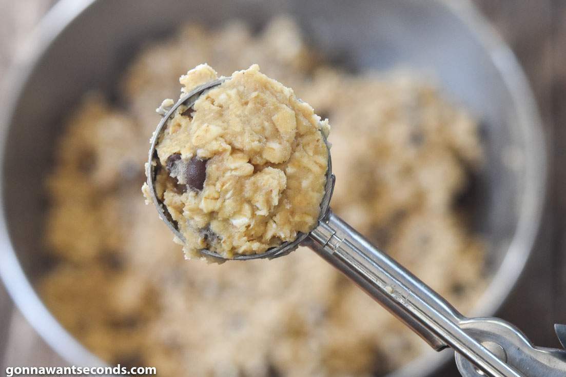 scooping oatmeal chocolate chip cookies dough 