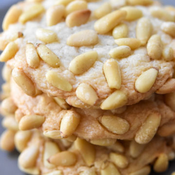 Pignoli Cookies stack on top of each other
