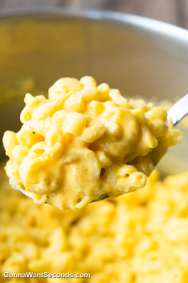 scooping Pioneer Woman mac and cheese