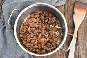 Step 1 how to make sausage tortellini soup, Saute the Italian sausage.