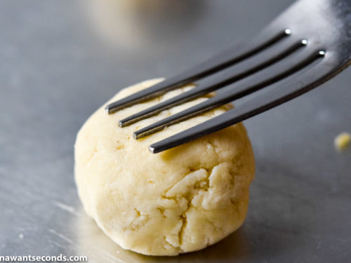 How to make Whipped shortbread cookies, fork flattening the dough