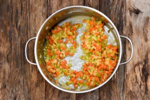How to make Cream of Chicken Soup, adding flour to the veggies