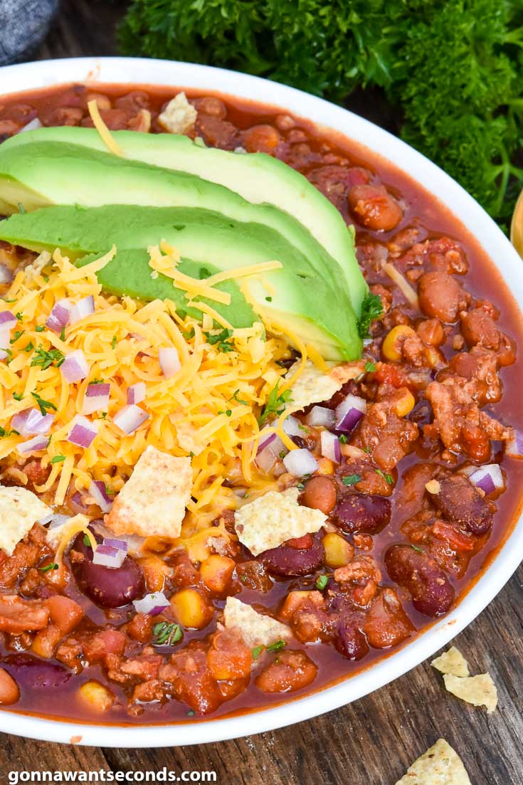 Instant pot turkey chili with toppings, on a bowl
