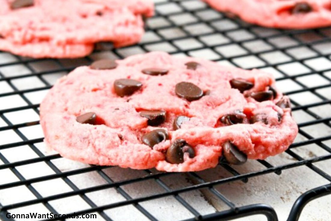 strawberry chocolate chip cookies on a cooling rack