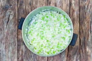 How to make Brunswick stew, sauteing aromatics in the pot