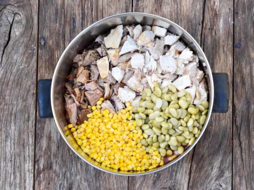 How to make Brunswick stew, adding corn and the rest of ingredients to the pot