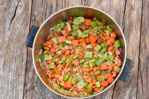 How to make Pork Stew, sauteing the veggies