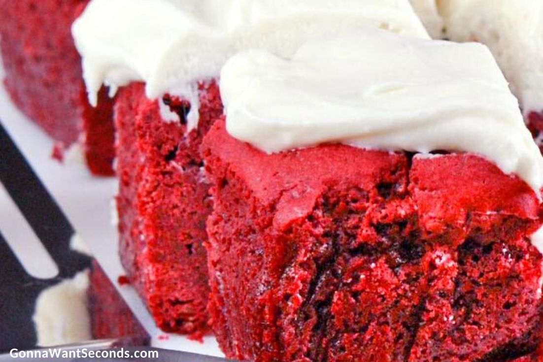 Slices of red velvet brownies with cream cheese frosting
