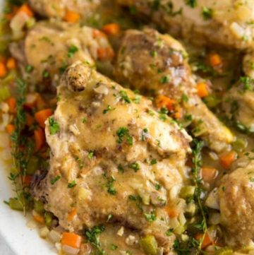 Smothered chicken on a serving plate
