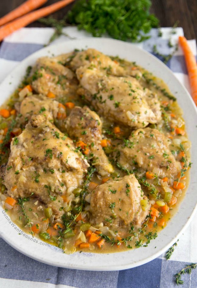 smothered chicken on a serving plate
