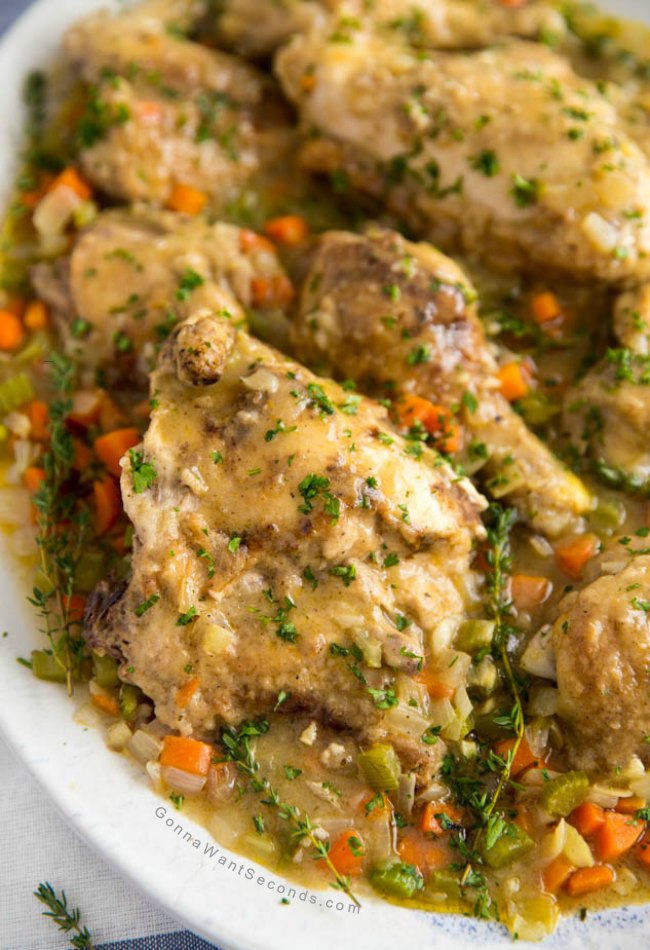smothered chicken on a serving plate