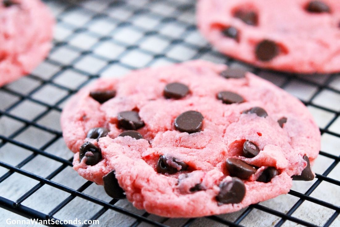Strawberry Chocolate Chip Cookies on a cooling rack