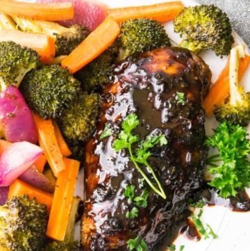 Honey Balsamic Chicken with broccoli, carrots, and onions on a plate