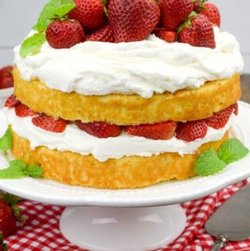 Strawberry Shortcake Cake on a cake stand