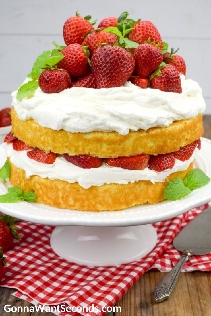 Strawberry Shortcake Cake on a cake stand