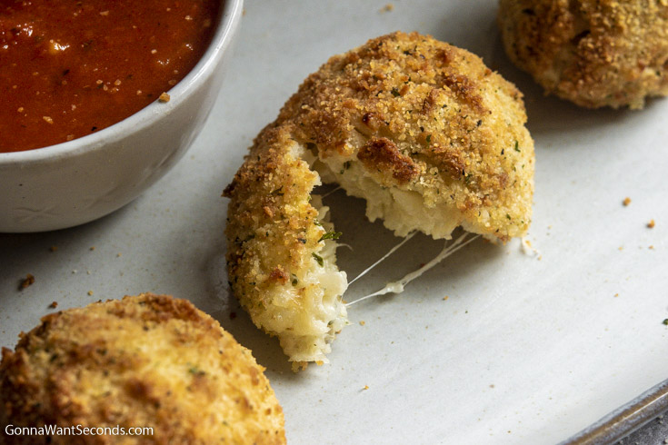 close up of the cheese inside this Air fryer arancini recipe