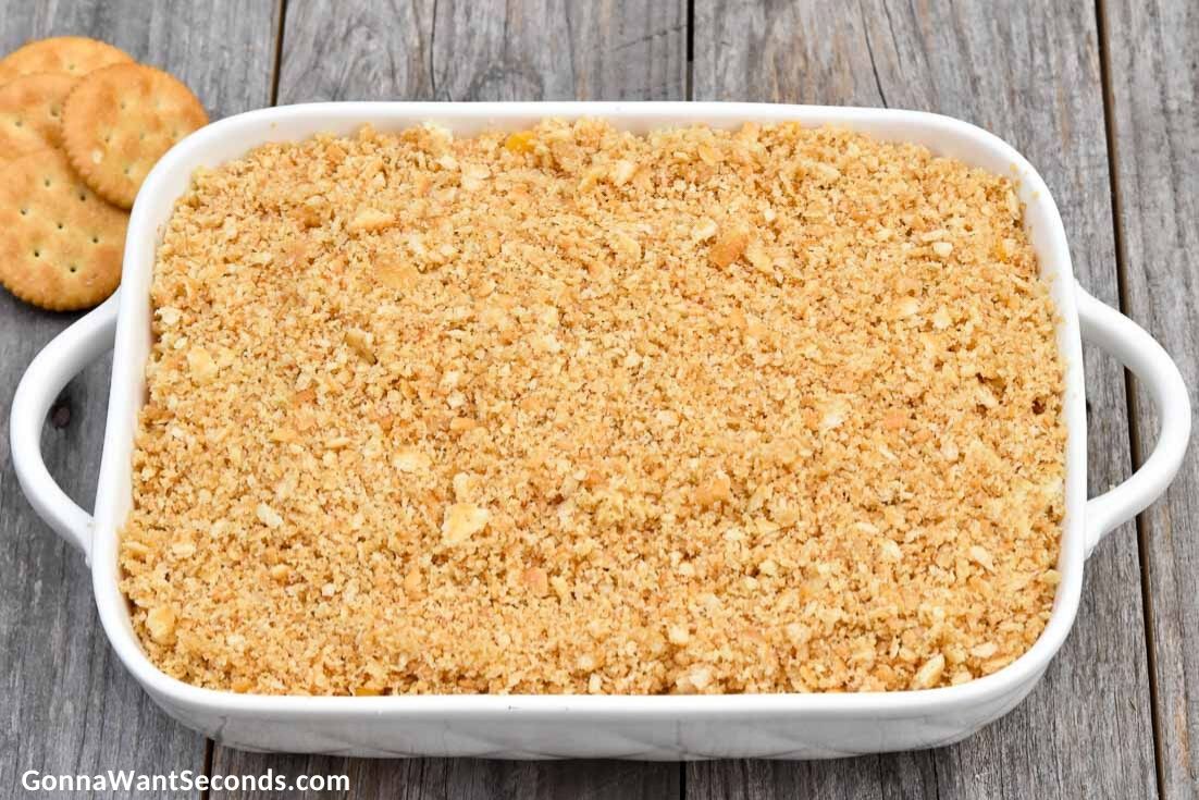 How to make Pineapple Casserole, layering crushed crackers