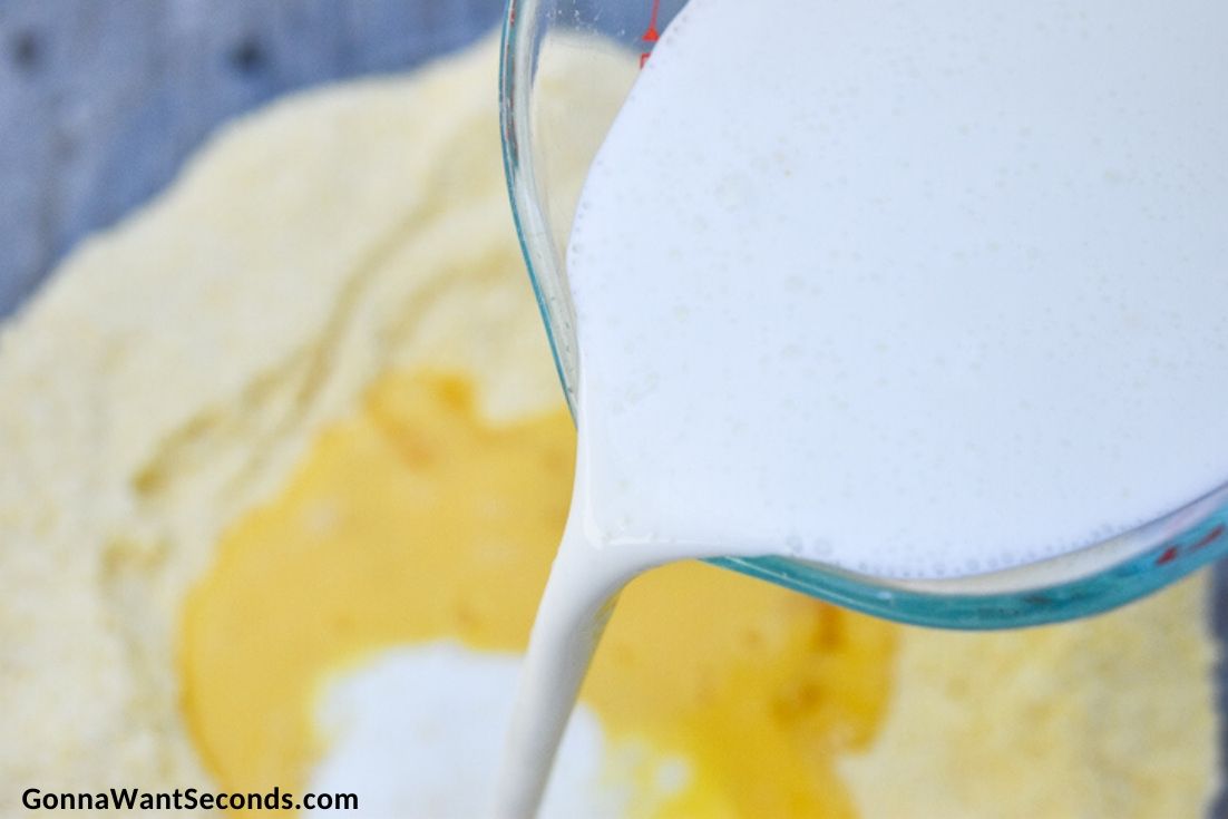 How to make Southern cornbread, pouring buttermilk into the dry ingredient mixture