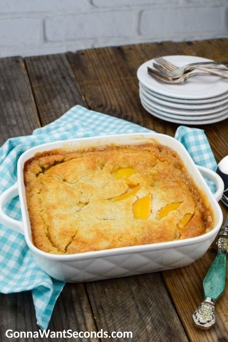 quick and easy bisquick peach cobbler in a baking dish