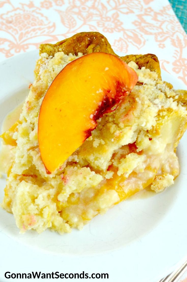 A slice of peaches and cream pie topped with fresh peach