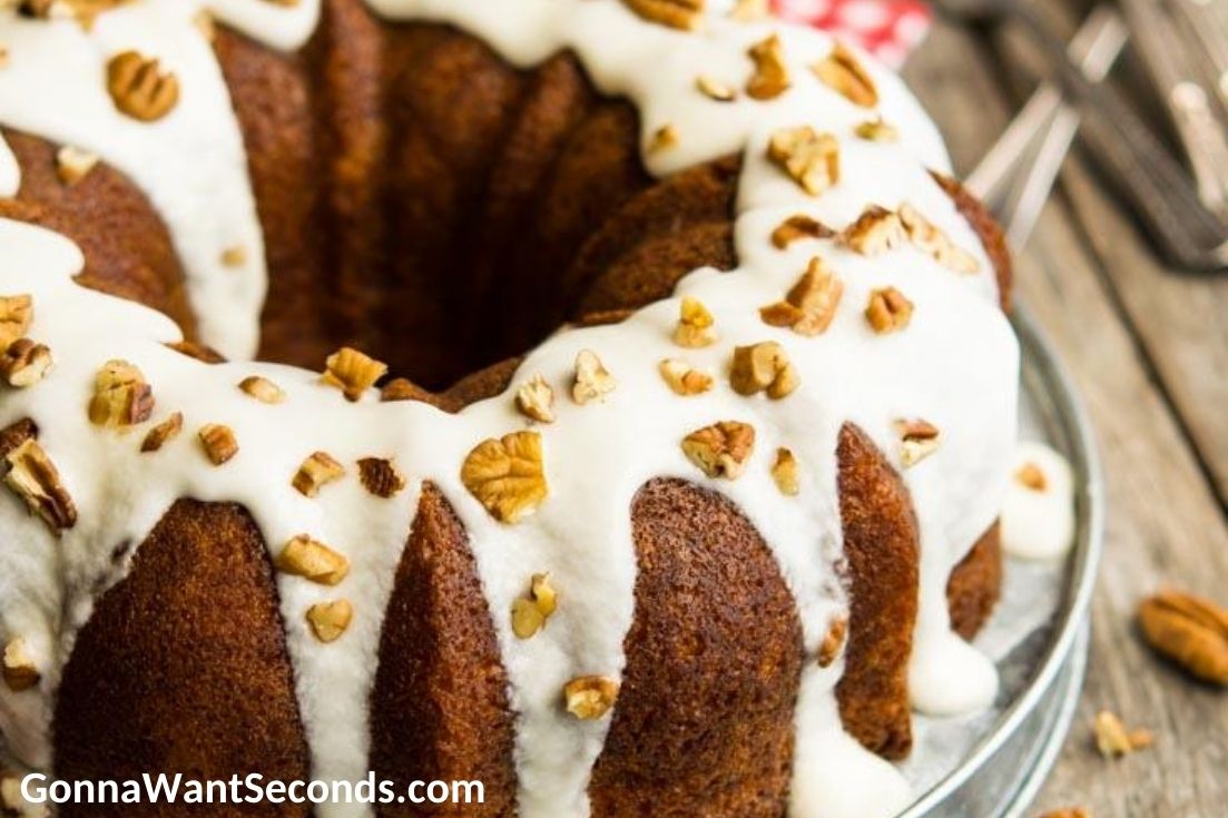 Sock It To Make Cake with glaze and pecans on top