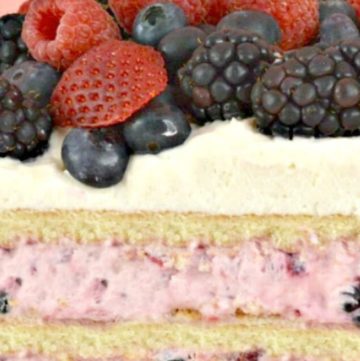 Triple Berry Icebox Cake sliced in half, showing layers