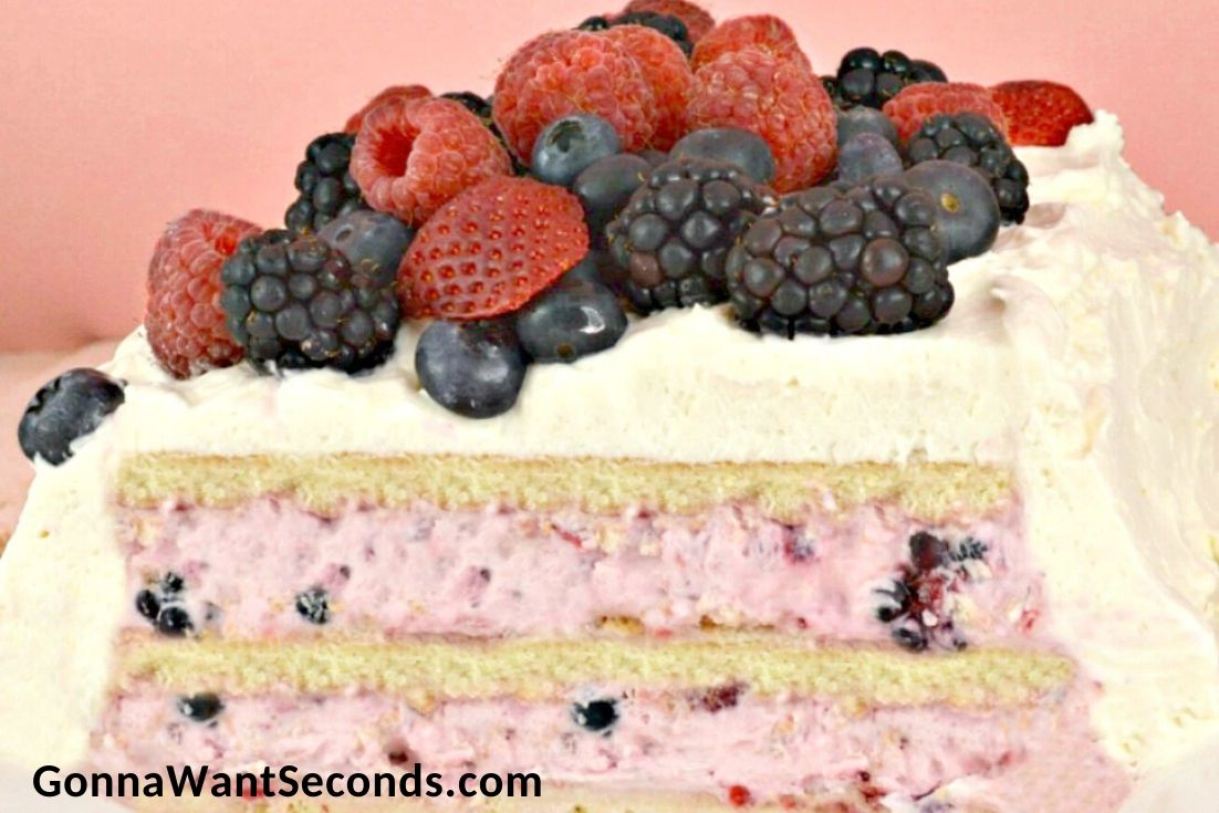 Triple Berry Icebox Cake sliced in half, showing layers