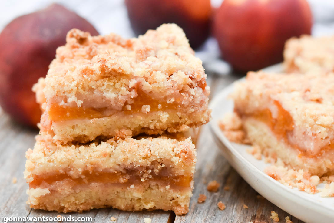 Peach crumb bars stack on top of each other