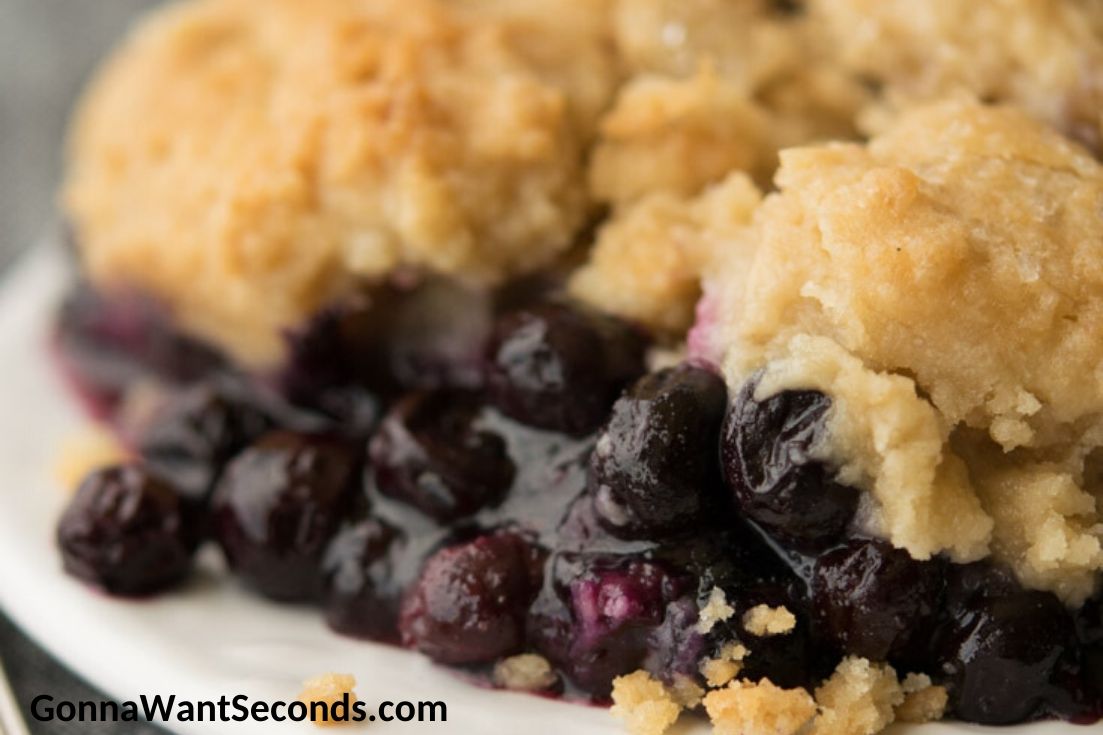 blueberry cobbler with frozen blueberries on a plate