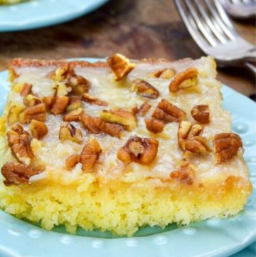 a slice of pineapple sheet cake on a plate
