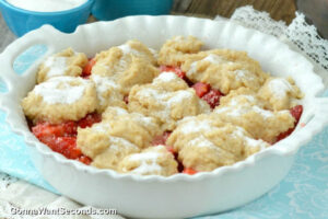 how to make strawberry cobbler step 4, drop the toppings over the strawberries