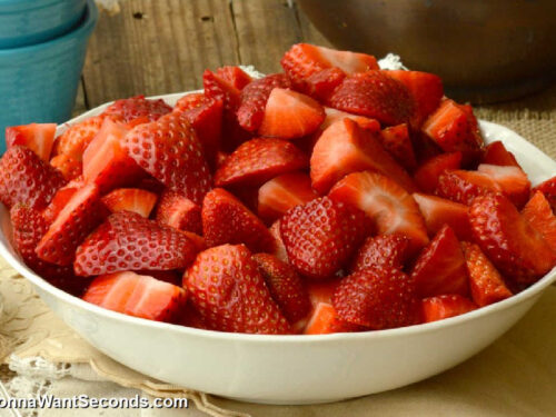 how to make fresh strawberry cobbler step 2, coat, toss, and transfer the strawberries in the baking dish
