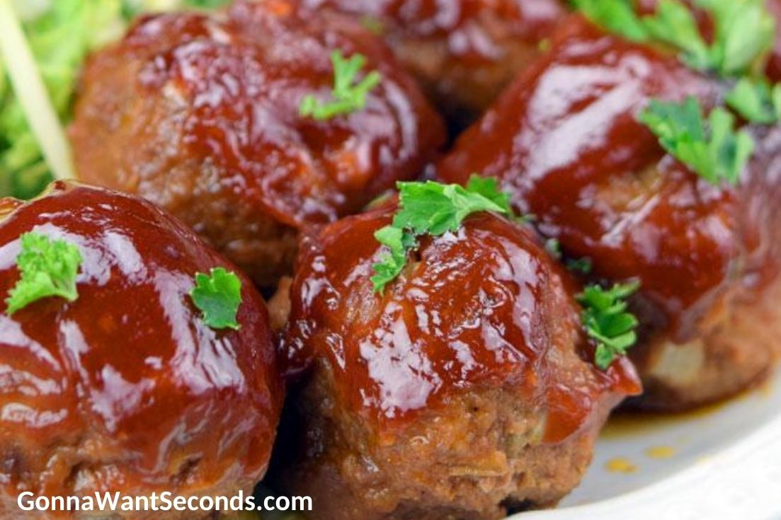 BBQ Meatballs with sauce on top, on a plate