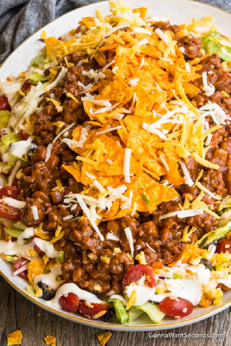 Dorito chips taco salad on a serving plate
