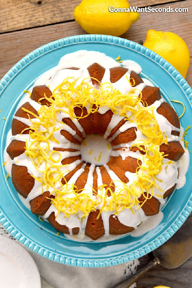 lemon pound cake with cream cheese on a cake stand