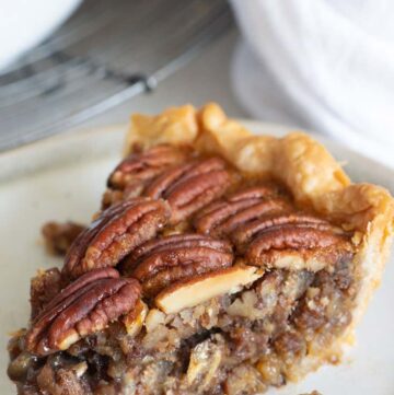 A slice of pecan pie on a plate
