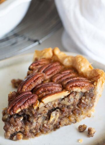 A slice of pecan pie on a plate