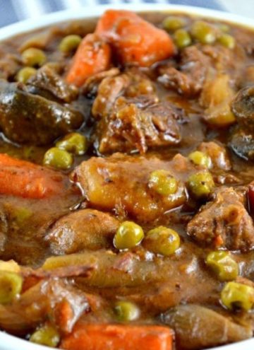 slow cooker beef stew with mushrooms in a bowl