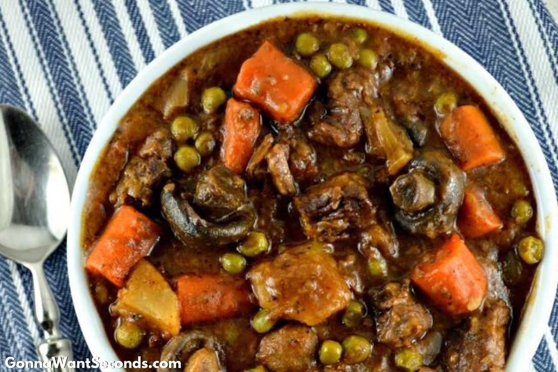 slow cooker beef stew and potatoes in a bowl