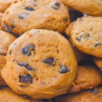 A pile of Pumpkin chocolate chip cookies on a plate